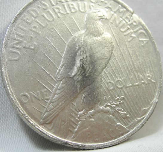Very-Odd-Peace-Dollar.-Any-Help-Appreciated
